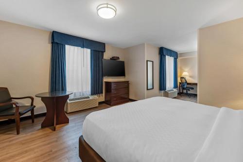 Voodi või voodid majutusasutuse Quality Inn toas