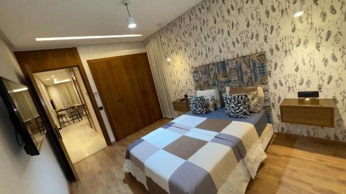 a hotel room with a bed and a mirror at CfC in Casablanca