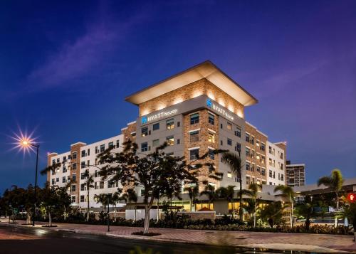a large building with lights on top of it at Hyatt House San Juan in San Juan