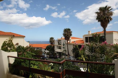 a view from the balcony of a apartment building at Vila Ventura in Caniço