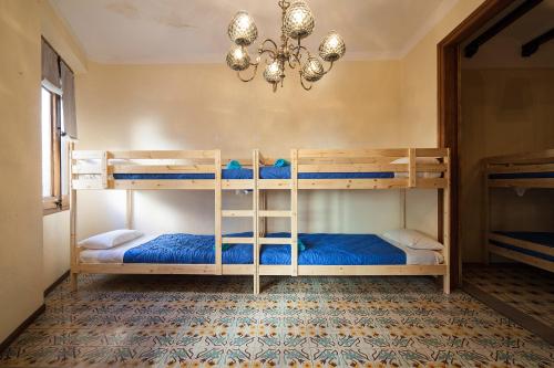 Postel nebo postele na pokoji v ubytování Bed in Girona