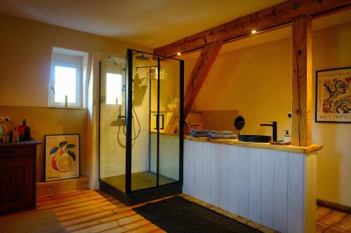 a bathroom with a shower with a glass enclosure at DieMosel Minimal in Traben-Trarbach