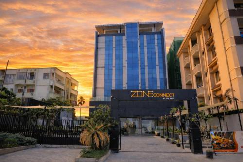 a building with a sign that reads zene covenant at Hema's Hotel Supreme in Visakhapatnam