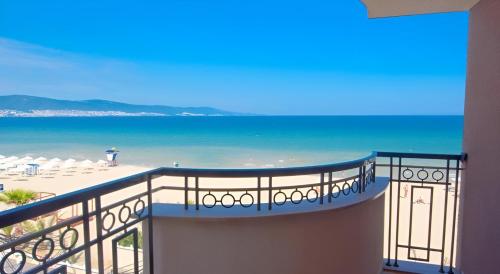 a balcony with a view of the beach at Hotel Golden Ina - All Inclusive - Beachfront in Sunny Beach