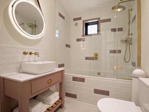 a bathroom with a sink and a shower at 2 Bed in Truro oc-93315 in Porthtowan