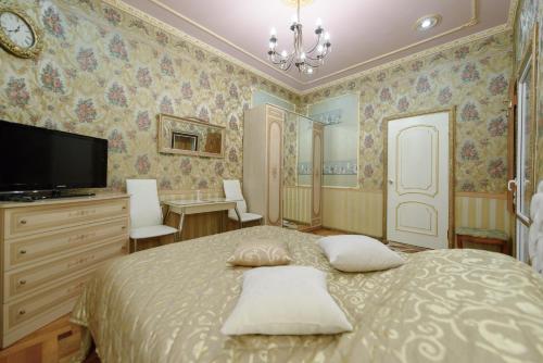Ένα ή περισσότερα κρεβάτια σε δωμάτιο στο Apartment Rubinshteyna 15