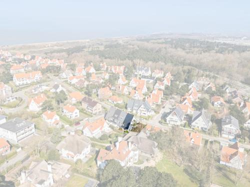 an aerial view of a town with houses at Summer Dream in De Haan