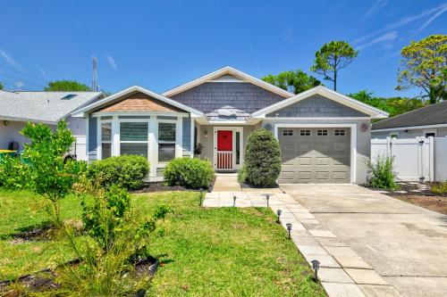 a house with a red door and a driveway at PrivateTropical Oasis in Jax Beach in Jacksonville Beach