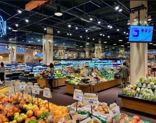 a grocery store filled with lots of fruits and vegetables at サンハウス 2 in Osaka