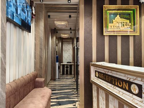 a hallway of a building with a sign that reads operation at Hotel Ajmer Pride in Ajmer