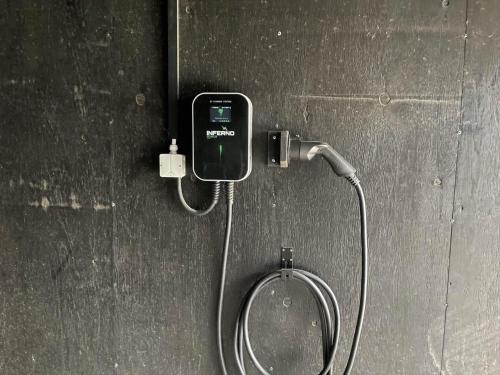 a shower with a hose attached to a wall at 702-Hvide-Sande-Slusen-2 in Hvide Sande