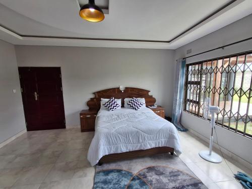 Krevet ili kreveti u jedinici u okviru objekta Chic Modern Escape