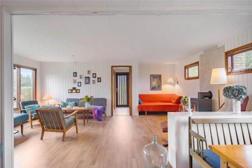 a living room with a couch and a table at R607-Rodvig-Stevns-Thormodsvej-7 in Rødvig