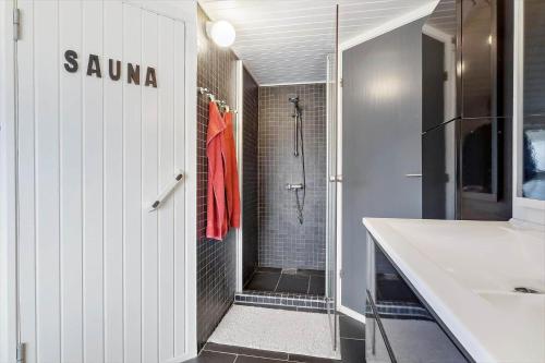 a bathroom with a shower and a sink at HA344-Saeby-Annesvej-1 in Sæby