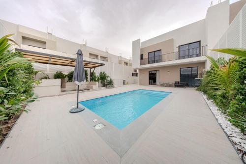 4BR Private Pool Villa in Sharjah - BBQ Area - Nasma