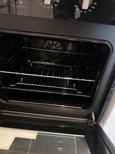 an oven with its racks inside of it at Stay in Brick Lane in London
