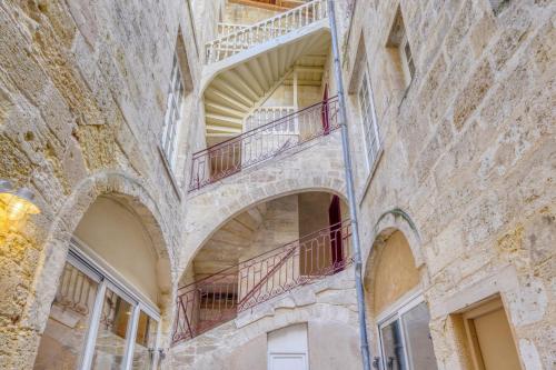 Loft d’exception dans un ancien chai avec parking et terrasse - Cœur de Bordeaux