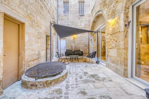 Loft d’exception dans un ancien chai avec parking et terrasse - Cœur de Bordeaux
