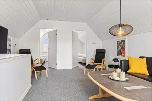 a living room with a table and chairs at 0456-Romo-Vestergade-227-Ap-15 in Høm