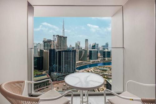 Peninsula One High Floor Apartment with beautiful Burj Khalifa and Canal Views