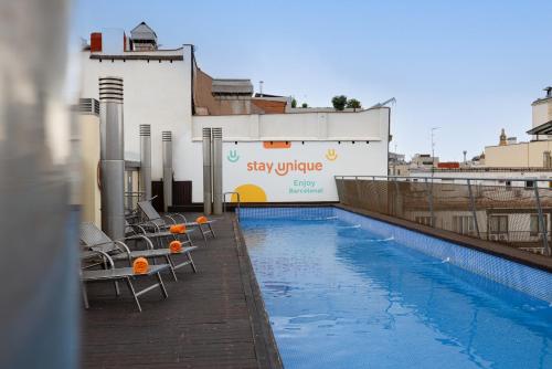 Foto Stay Unique Apartments Pau Claris con piscina
