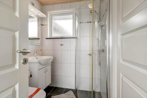 a bathroom with a shower and a toilet and a sink at BV138-Esbjerg-V-Sjelborgdalen-108 in Esbjerg