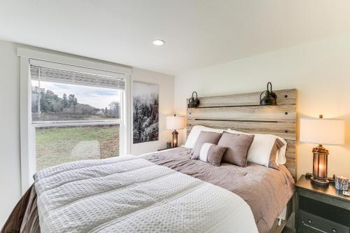 a bedroom with a large bed and a window at Great Outdoor Space! Serene Getaway in Oakland in Oakland