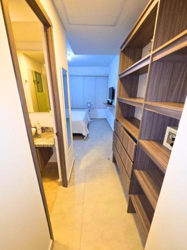 a hallway leading to a room with a bedroom at Golden Breeze in Cartagena de Indias