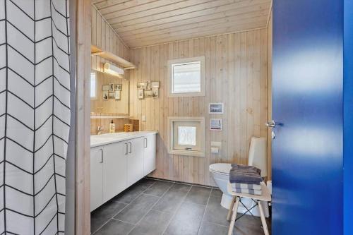 a bathroom with a sink and a toilet in it at FY261-Ebberup-Hasselvaenget-22 in Ebberup