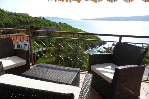 Apartments with parking space Senj - 25395