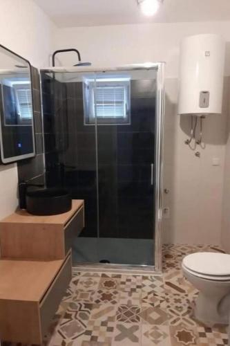 Apartments with parking space Senj - 25395