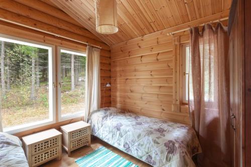 Postel nebo postele na pokoji v ubytování Toriko Village