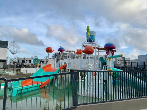 a water park with a water slide and slides at Vibe and Stay - Staycation home near Tagaytay in Calo