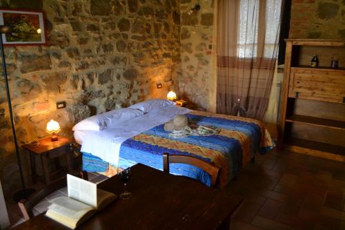 Ένα ή περισσότερα κρεβάτια σε δωμάτιο στο Agriturismo Marano