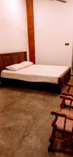 a bedroom with a bed in a room at Ahangama Wave Nook in Ahangama