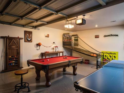 a room with a pool table and a net at Private Pool Retreat Near Disney Game Room Firepit in Fullerton
