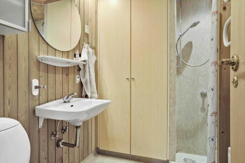 a bathroom with a sink and a shower at 30536-Odder-Strandagervej-3 in Odder