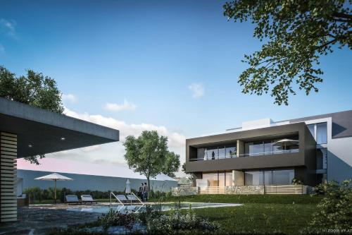 a modern house with a pool in front of it at Weinlodge Siedler in Mautern