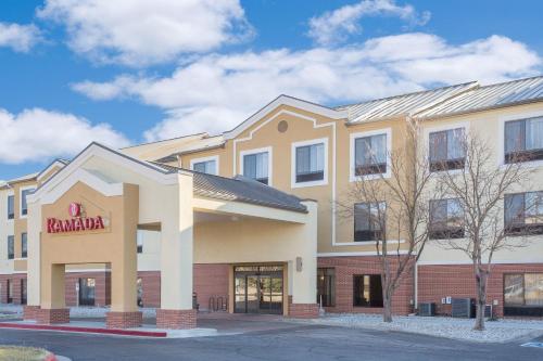a rendering of the front of a hampton inn at Ramada by Wyndham Denver International Airport in Denver