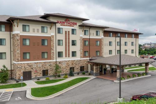 a rendering of a hotel with a parking lot at Hawthorn Suites by Wyndham Wheeling at The Highlands in Triadelphia