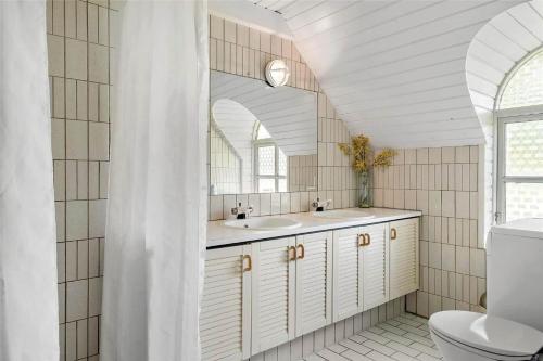 a bathroom with a sink and a toilet at 10616-Ulfborg-Vester-Mosevej-28 in Ulfborg
