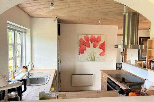a kitchen with a sink and a counter top at 20708-Ulfborg-Sortebaervej-6 in Ulfborg
