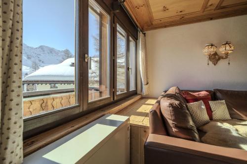 Chalet Marmotta 2 by Arosa Vacations, Privates Familienhaus direkt an der Skipiste