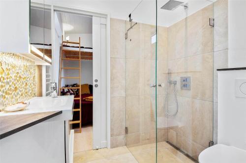 a bathroom with a shower and a sink at SL287-Slagelse-Strandvaenget-14 in Slagelse