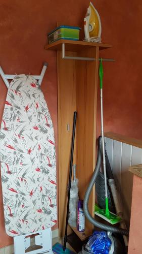 a room with a rack with a bed with fish on it at Jani's Holiday Apartment in Interlaken
