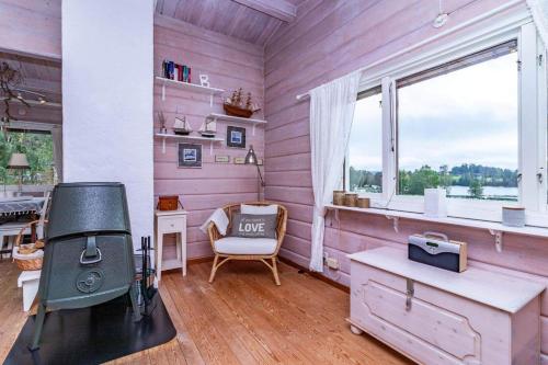 a room with a desk and a chair and a window at VAR101-Arjaeng in Årjäng