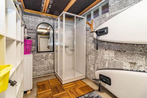 a bathroom with a walk in shower and a toilet at VAR101-Arjaeng in Årjäng