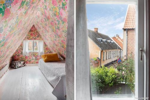 two pictures of a bedroom with a wall covered in flowers at SKA117-Simrisham-Skepparegatan-6 in Simrishamn