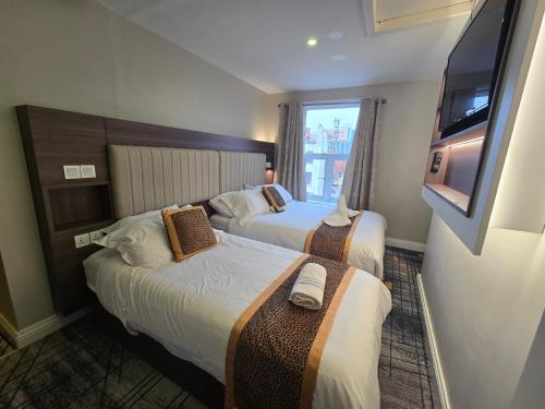 เตียงในห้องที่ Double bedroom studios