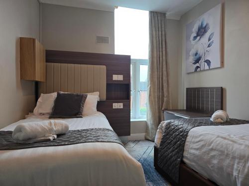 Postel nebo postele na pokoji v ubytování Double bedroom studios